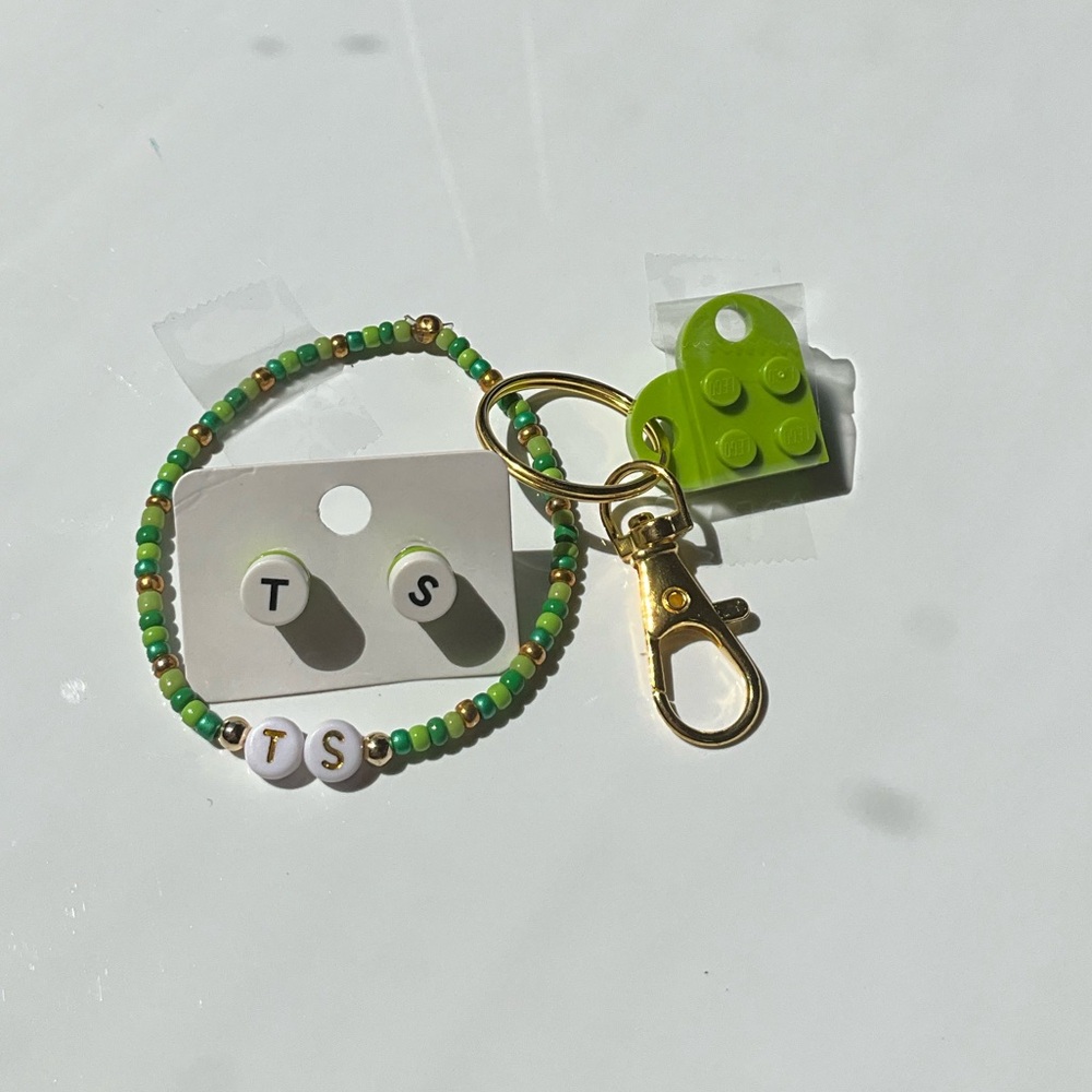 Taylor Swift Keychain Bracelet And Pair Of Earrings